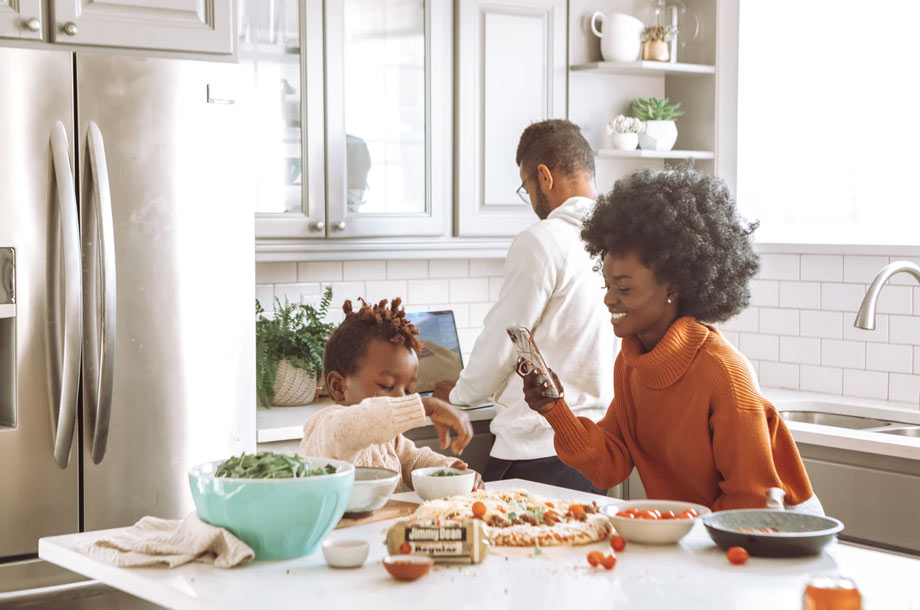 Young family with child in kitchen | Life Insurance